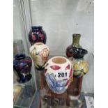 SIX MOORCROFT VASES OF VARIOUS PATTERNS