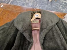 A LADYS BLYVOOR BROWN SHEEP SKIN COAT