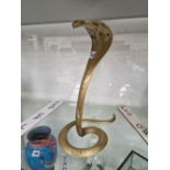 A BENARES BRASS FIGURE OF COBRA READY TO STRIKE