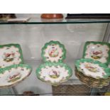 A DOULTON GREEN BORDERED DESSERT SERVICE PRINTED WITH EXOTIC BIRDS
