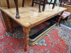 A LARGE PINE KITCHEN TABLE.