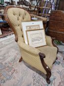 A VICTORIAN MAHOGANY SHOW FRAME HOOP BACK ARMCHAIR WITH BUTTON UPHOLSTERED BACK