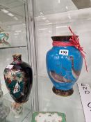 A JAPANESE WIRELESS CLOISONNE BLUE GROUND VASE DECORATED WITH GEESE TOGETHER WITH A CLOISONNE VASE