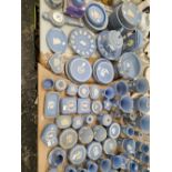 A LARGE COLLECTION OF WEDGWOOD BLUE JASPER WARES, TO INCLUDE: A CLOCK, A BAROMETER AND
