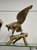 A BRASS FIGURE OF AN EAGLE WITH SPREAD WINGS