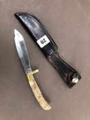 A GOOD QUALITY TRUELOVE 1897 MODEL HUNTING KNIFE WITH SHEATH.