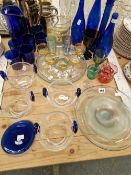 A BLUE GLASS LEMONADE SET, OTHER BLUE GLASS AND DRINKING WARES TOGTHER WITH GLASS BOWLS