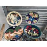 FOUR MOORCROFT DISHES OF VARIOUS PATTERNS