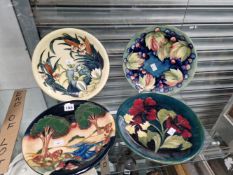 FOUR MOORCROFT DISHES OF VARIOUS PATTERNS