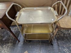 A GILT METAL THREE TIER TROLLEY, THE TOP A LIFT OFF TRAY.