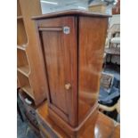 A VICTORIAN MAHOGANY BEDSIDE CABINET.