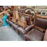 A SET OF ELEVEN GOTHIC REVIVAL OAK CHAIRS INCLUDING ONE CARVER.