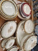 A BOOTHS OR REPOUSSE PATTERN PART DINNER SET TOGETHER WITH OTHER PLATES AND A PLATTER