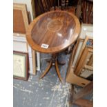 A REGENCY STYLE ROSEWOOD WINE TABLE.