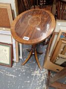 A REGENCY STYLE ROSEWOOD WINE TABLE.