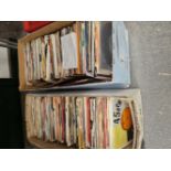 A COLLECTION OF APPROXIMATELY 300 45 RPM RECORD SINGLES, 1960S TO 80S.