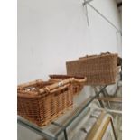 A COLLECTION OF BASKETS.