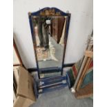 A BLUE CHINOISERIE DECORATED WALL MIRROR AND MATCHING ADJUSTABLE BOOK TROUGH.