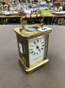 A COLLINGWOOD AND SON BRASS CASED CARRIAGE CLOCK.