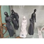 FOUR DOULTON BLACK BASALT FIGURES TOGETHER WITH A DOULTON WHITE GLAZED MOTHER AND DAUGHTER GROUP