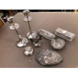A PAIR OF HALLMARKED SILVER CANDLESTICKS WITH WEIGHTED BASES, TOGETHER WITH SILVER MOUNTED GLASS