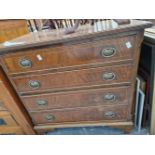 A REGENCY STYLE FOUR DRAWER SMALL CHEST.