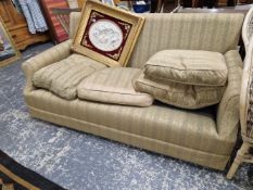 A VINTAGE THREE SEAT SOFA WITH LOOSE CUSIONS