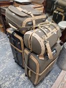 A LARGE SAMSONITE SUITCASE TOGETHER WITH THREE OTHERS COVERED IN TWEED.
