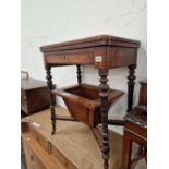 A VICTORIAN, WALNUT AND INLAID SEWING TABLE WITH FOLDOVER TOP.