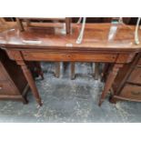 A WILLIAM IV MAHOGANY AND INLAID FOLD OVER CARD TABLE.