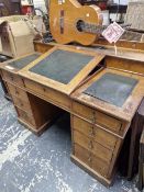 AN EARLY 20th C. OAK PEDESTAL DESK WITH A CENTRAL LIDDED COMPARTMENT SLOPING DOWN FROM THE GALLERIED