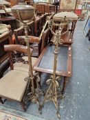 A NEAR PAIR OF VICTORIAN ARTS AND CRAFTS STYLE BRASS STANDARD LAMPS.