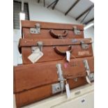 THREE VINTAGE LEATHER SUITCASES.