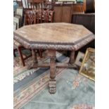 A GOOD QUALITY VICTORIAN CARVED OAK OCTAGONAL CENTRE TABLE.