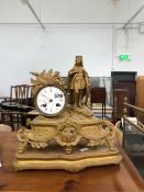 A LATE 19th C. FRENCH GILT SPELTER MANTEL CLOCK STRIKING ON A BELL AND SURMOUNTED BY A ROYAL KNIGHT