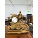 A LATE 19th C. FRENCH GILT SPELTER MANTEL CLOCK STRIKING ON A BELL AND SURMOUNTED BY A ROYAL KNIGHT