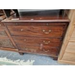 A GEO. III MAHOGANY SMALL BATCHALORS CHEST OF 3 DRAWERS WITH BRUSHING SLIDE.