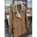 A LAMBSKIN THREE QUARTER LENGTH COAT