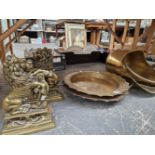 A BRASS COAL SCUTTLE WITH SHOVEL, TWO BRASS DISHES AND TWO BRASS LION DOORSTOPS