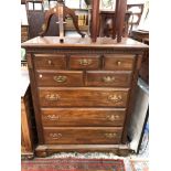 A KLING COLONIAL MAHOGANY CHEST, THE FIVE DRAWERS BETWEEN FLUTED PILASTERS ABOVE BRACKET FEET. W 102