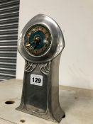 A LIBERTY HERITAGE PEWTER CASED BATTERY OPERATED CLOCK WITH A GREEN ENAMEL DIAL
