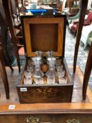 A MARQUETRIED ROSEWOOD DECANTER BOX OF FOUR DECANTERS AND TEN GLASSES