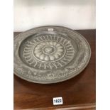 AN 18th C. PEWTER DISH WORKED WITH A CENTRAL ROSETTE IN RELIEF, ONE TOUCH MARK INSCRIBED RAYMOND.