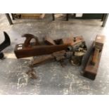 TWO LARGE CARPENTERS BLOCK PLANES, A COBBLERS LAST, A GIN TRAP, BLOW TORCH ETC