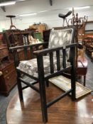 A VINTAGE RECLINING BARBERS CHAIR
