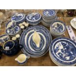 A BLUE AND WHITE WILLOW PATTERN PART SERVICE TOGETHER WITH A DENBY BLUE GLAZED TEA POT