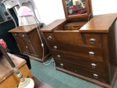 A MODERN HARDWOOD LIFT TOP DRESSING CHEST AND A SIMILAR SIDE BOARD.