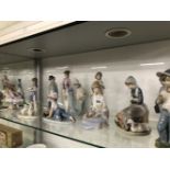 TWELVE LLADRO PORCELAIN FIGURES