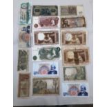 SIXTEEN VARIOUS WORLD BANK NOTES TO INCLUDE A TEN SHILLINGS AND ONE POUND EXAMPLE.