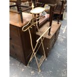 A WROUGHT METAL VALET STAND